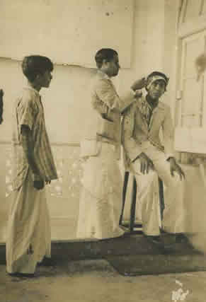 Photo of Chandra Hirjee receiving medical treatment for his injury